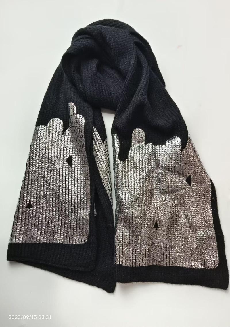 Black ribbed knit winter scarf with shiny silver metallic foil city skyline and drip pattern on both ends