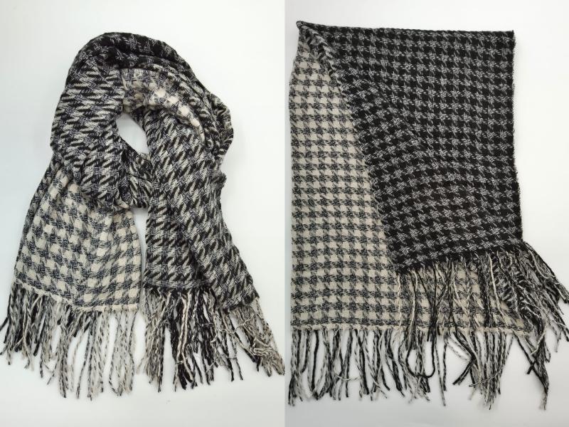 Black and cream houndstooth pattern woven scarf with long fringe trim, shown draped and flat lay views