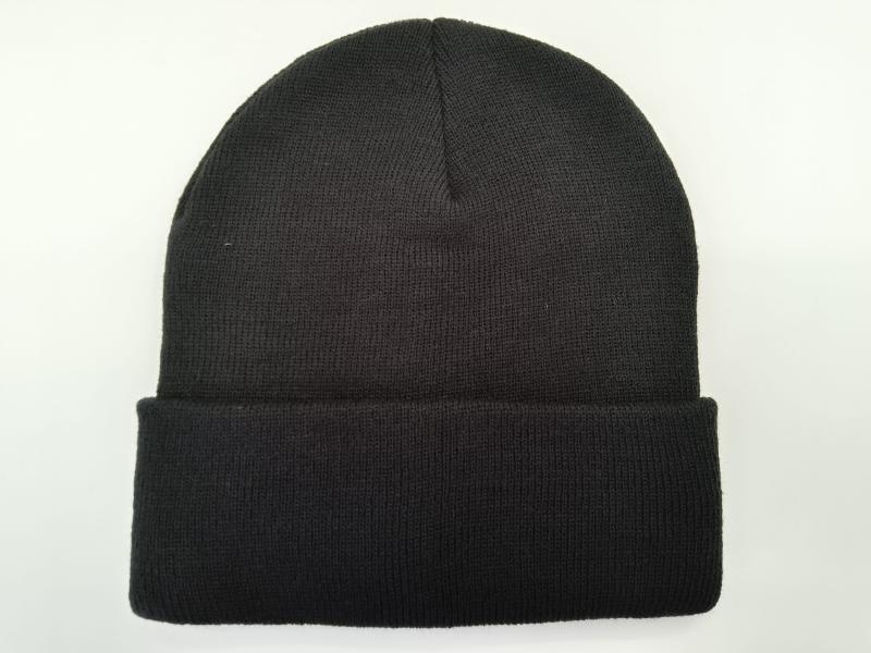 Plain black ribbed knit beanie with folded cuff, laid flat on white background, unisex winter hat