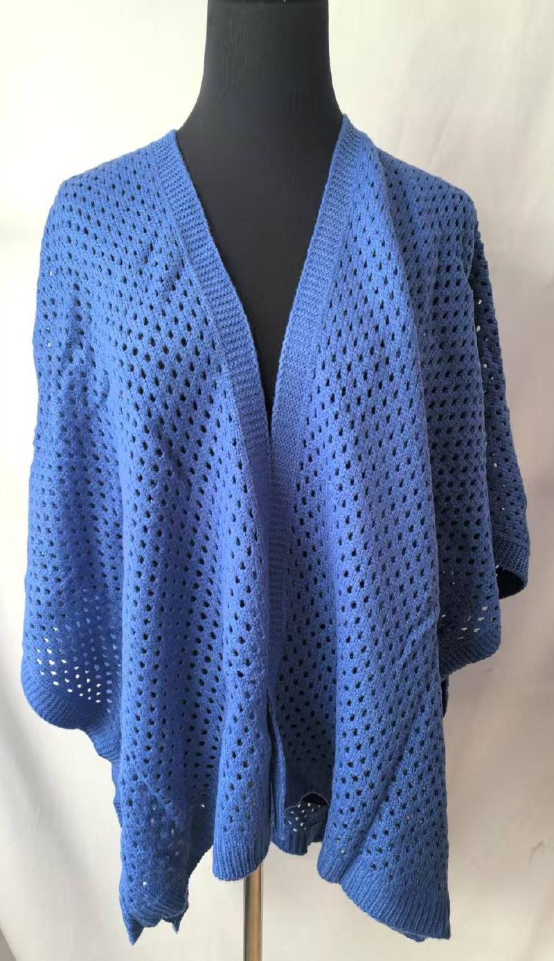 Blue open-knit cocoon cardigan wrap with eyelet pattern displayed on mannequin, featuring wide sleeves and open front