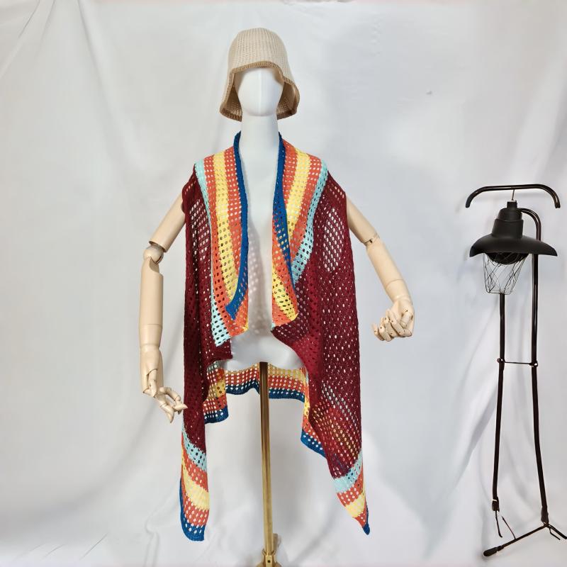 Mannequin wearing a burgundy crochet open-knit sleeveless cardigan with rainbow multicolor stripe border trim