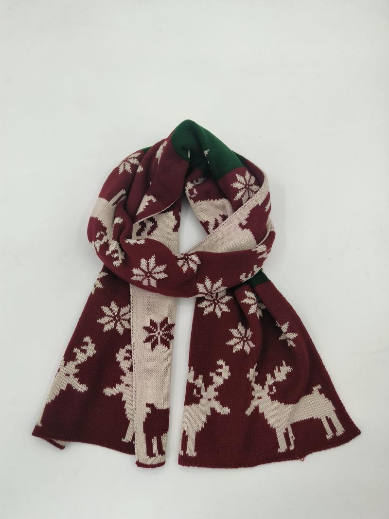 Burgundy and cream knitted scarf with reindeer and snowflake Nordic pattern, looped and draped on white background