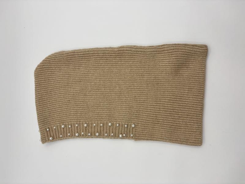 Camel beige ribbed knit neck warmer tube scarf with pearl bead trim along the bottom edge, laid flat on white background