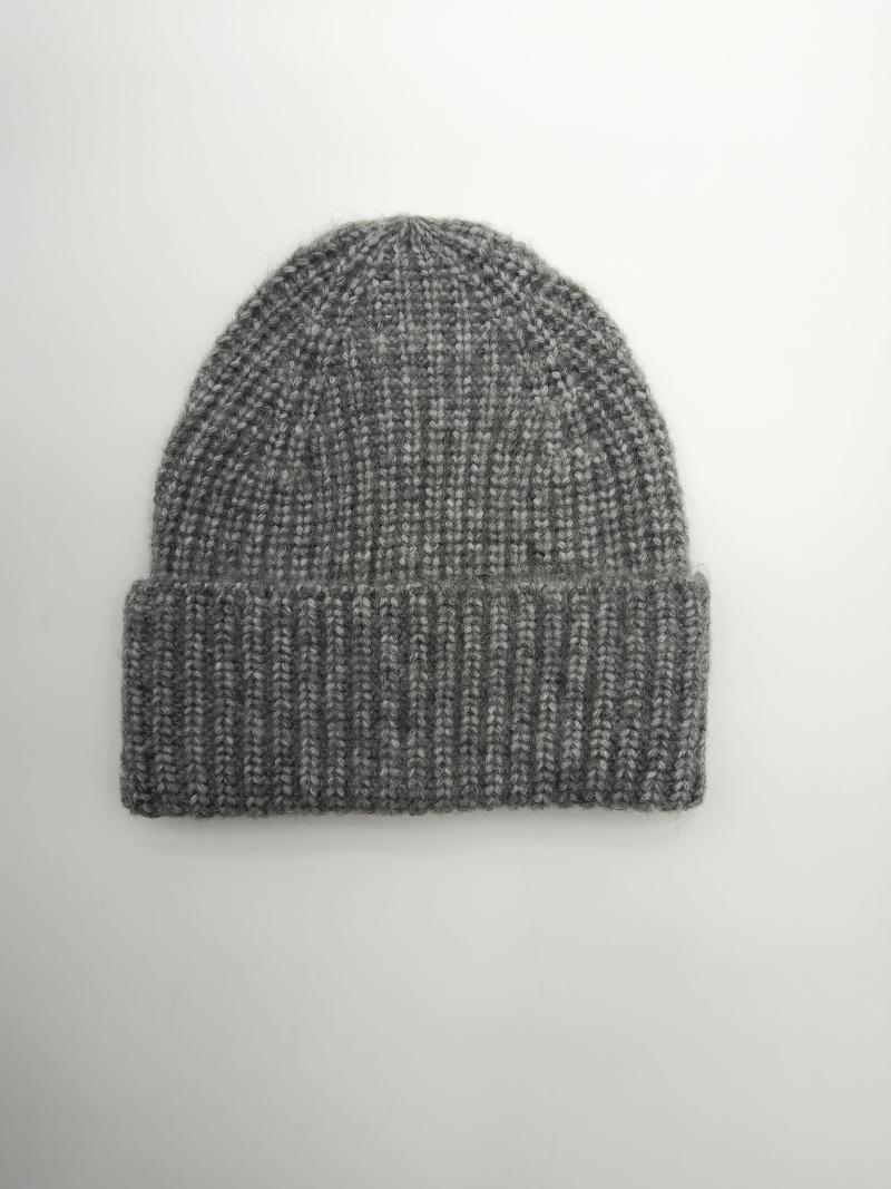 Flat lay of a chunky ribbed knit beanie hat in heather grey with a folded cuff, photographed on white background