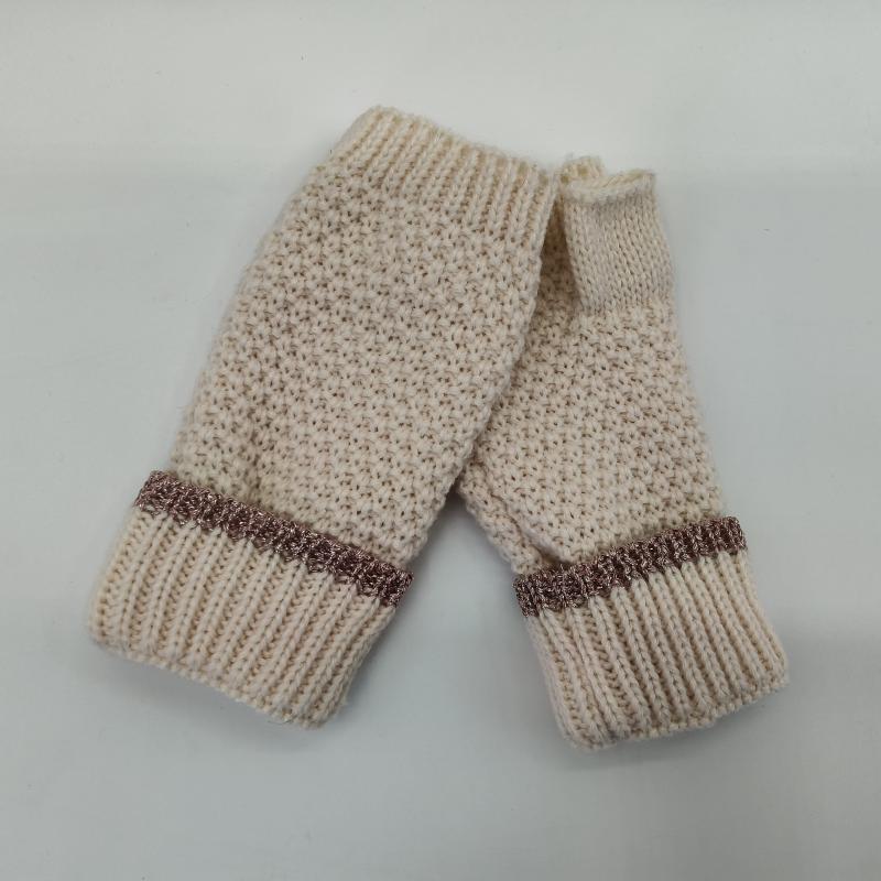 Pair of cream chunky knit fingerless gloves with ribbed cuffs and rose gold metallic trim accent band