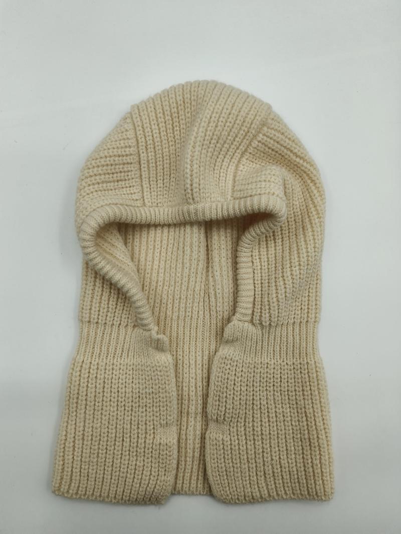 Cream ribbed knit balaclava full face ski mask laid flat on white background, chunky winter head covering