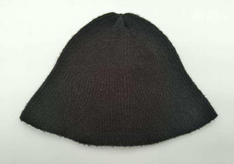 Dark charcoal ribbed knit wool beanie hat laid flat on white background showing textured rib pattern