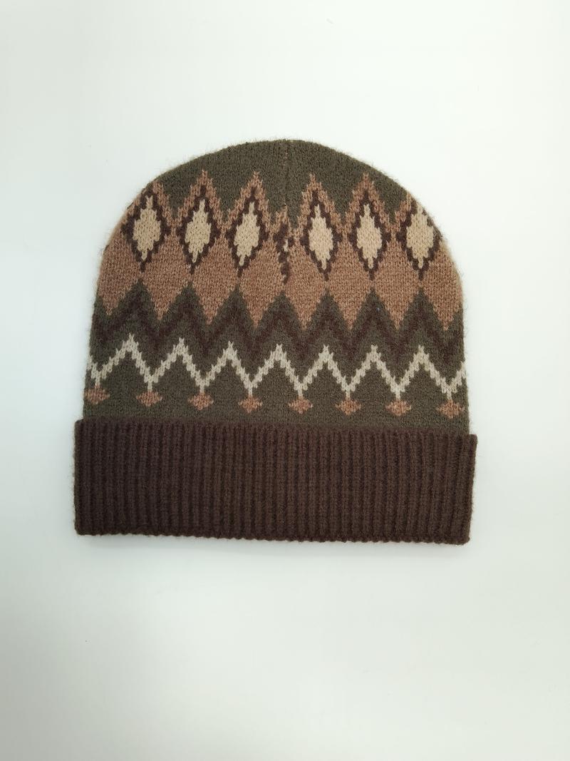 Brown olive and cream Fair Isle patterned knit beanie hat with ribbed cuff and diamond zigzag design on white background