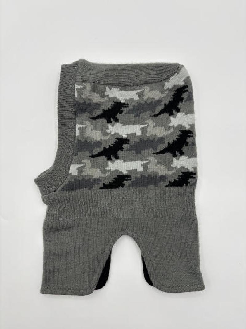 Grey knit balaclava laid flat showing black white grey camouflage jacquard pattern on front panel with ribbed edges