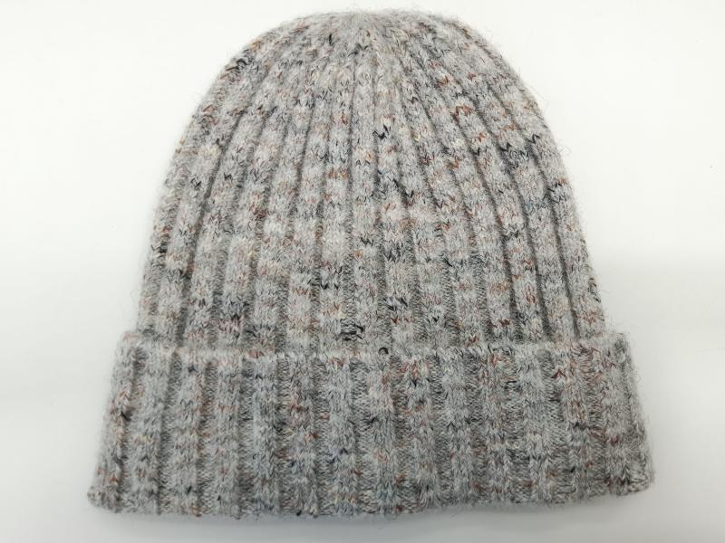Grey marl ribbed knit beanie hat with multicolor flecked yarn and folded cuff, laid flat on white background