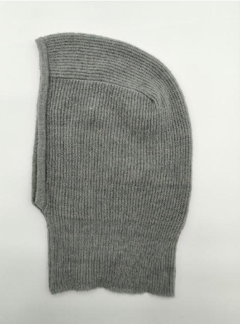 Flat lay of a grey ribbed knit balaclava hood with face opening on white background