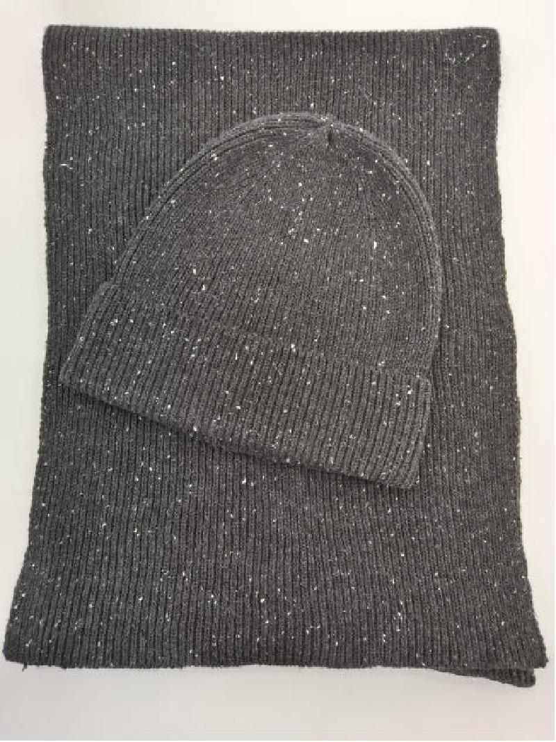 Grey ribbed knit beanie hat and matching scarf set with white fleck speckle detail, laid flat on white background