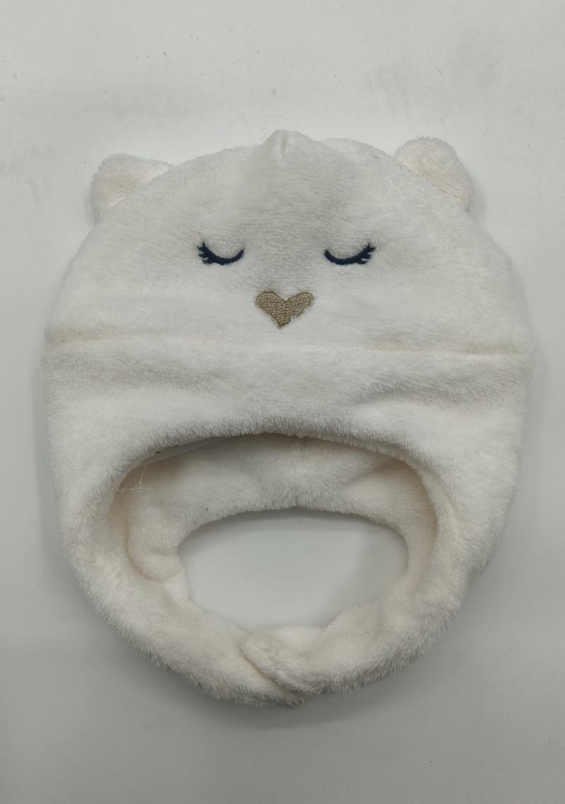 Soft white fleece infant hat shaped like a bear with embroidered closed eyes, gold heart nose, and small ears
