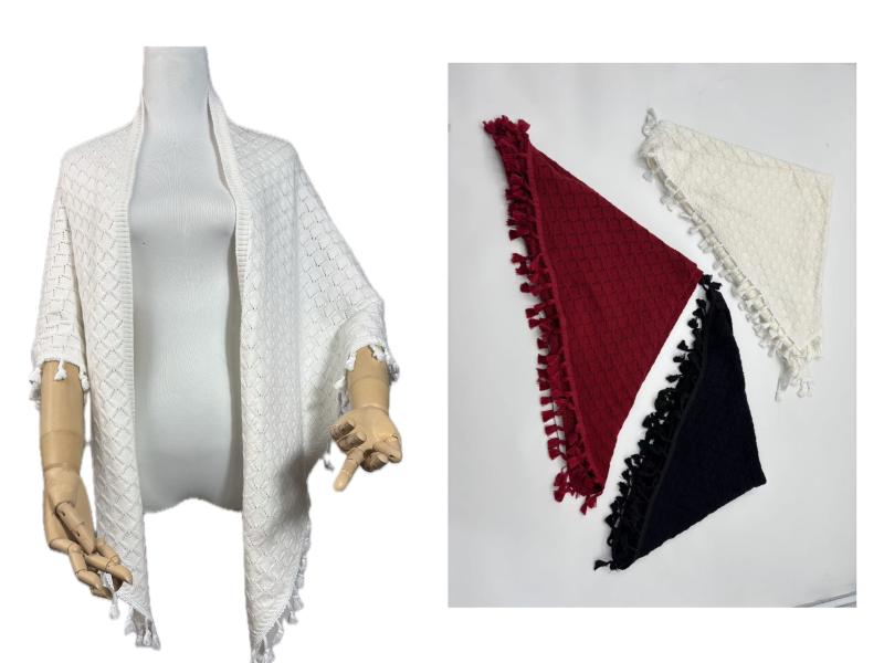 White diamond-knit tassel shawl wrap on mannequin with red, black, and white color variants folded beside it