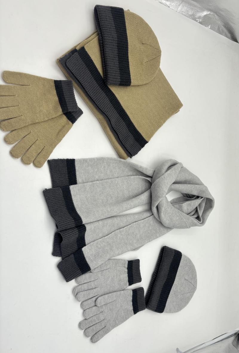 Two knit winter accessory sets with beanie hat, scarf, and gloves in tan and light grey with dark stripe accents