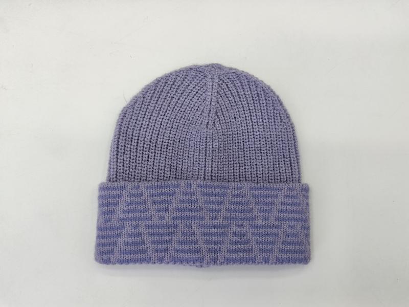 Lavender purple ribbed knit beanie hat with folded jacquard patterned cuff on white background