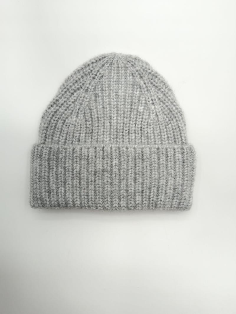 Light grey chunky ribbed knit beanie hat with folded cuff, laid flat on white background, soft wool blend
