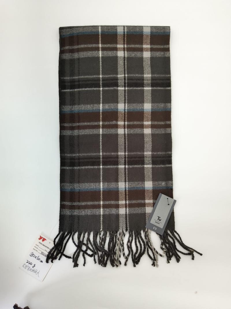 Men's grey and brown tartan plaid scarf with white and blue accents and knotted fringe ends laid flat on white background