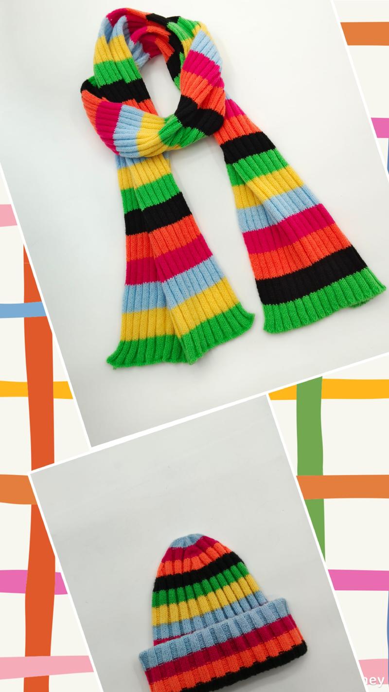 Bright multicolor striped ribbed knit scarf and matching beanie hat set with rainbow stripes in green, yellow, orange, pink, black, and blue