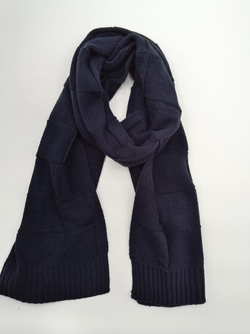 Navy blue chunky knit scarf with alternating block texture pattern and ribbed ends, displayed flat on white background