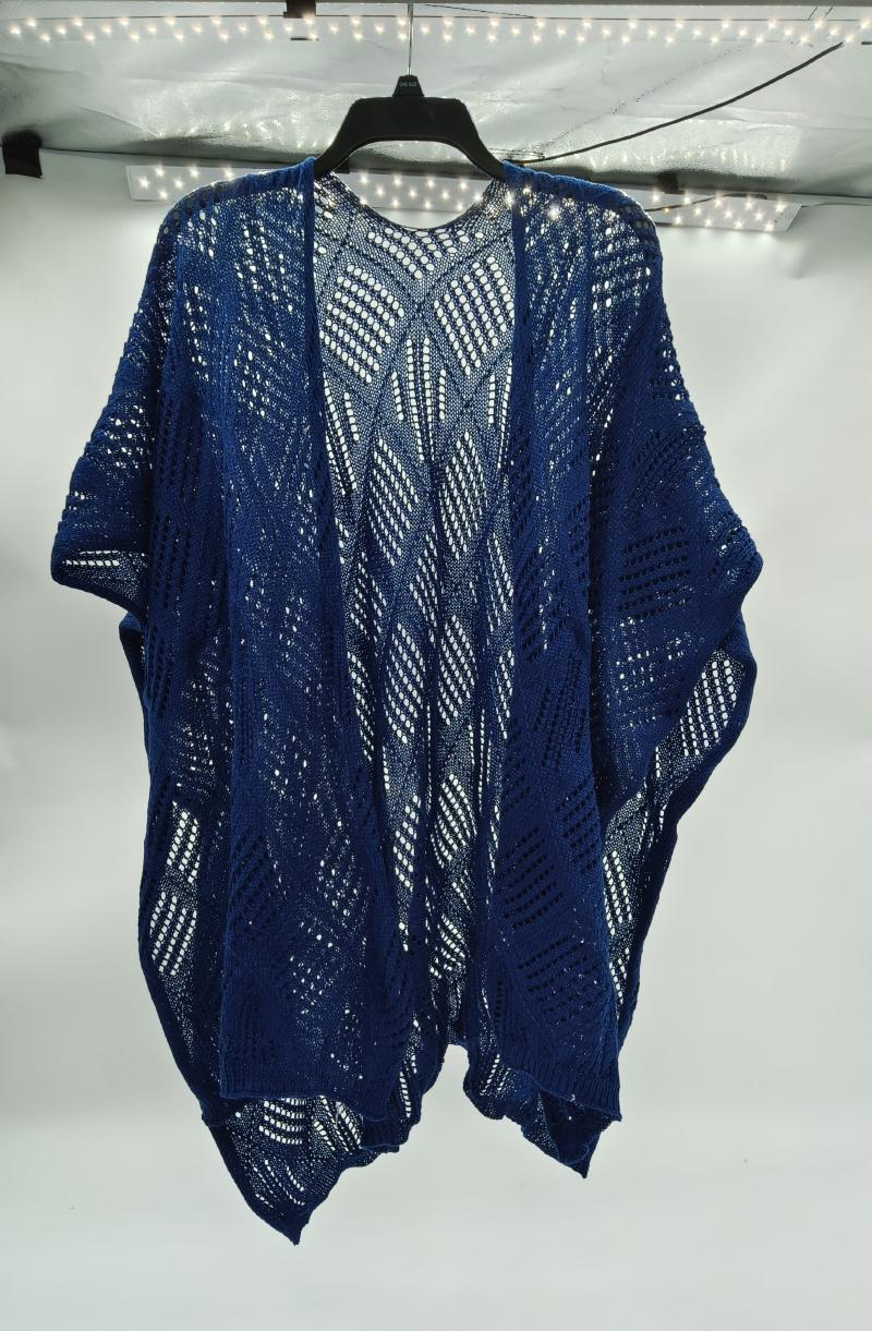 Navy blue open-front crochet lace knit kimono cardigan with diagonal wave pattern hanging on black hanger