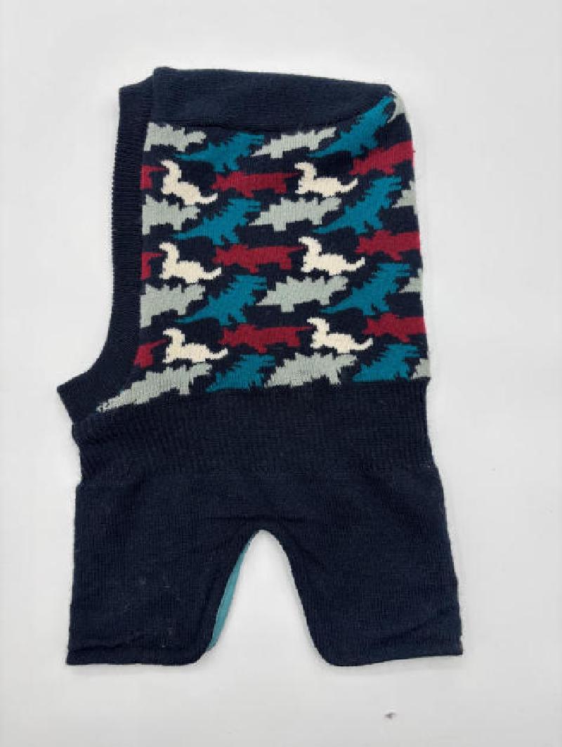 Knitted sleeveless dog sweater in navy blue with teal, burgundy, white abstract bird intarsia pattern, laid flat
