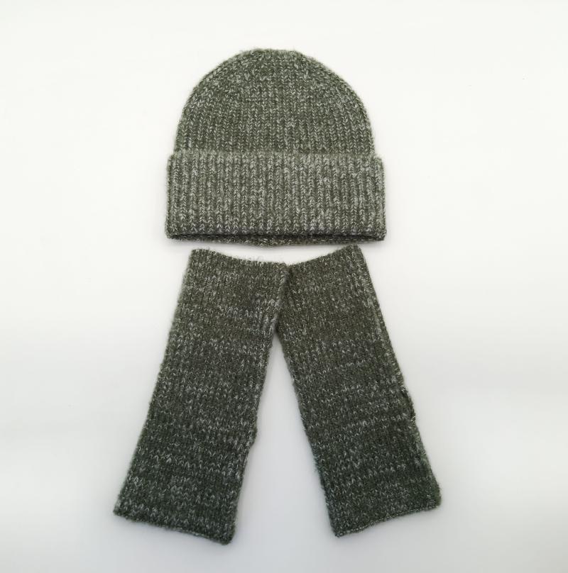 Olive green marl ribbed knit beanie hat and matching fingerless gloves set laid flat on white background