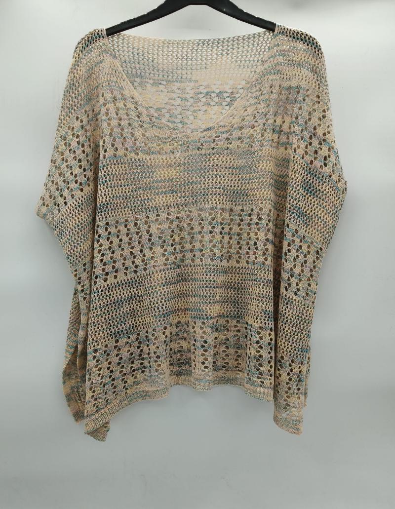 Beige and teal open-knit crochet batwing sleeve top with stripe pattern and large holes, displayed on hanger